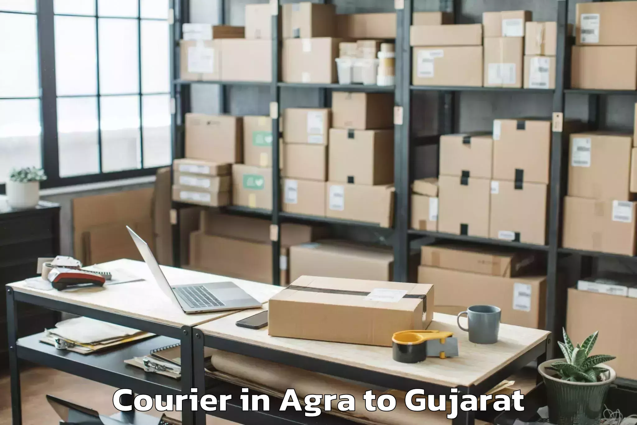 Reliable Agra to Unjha Courier